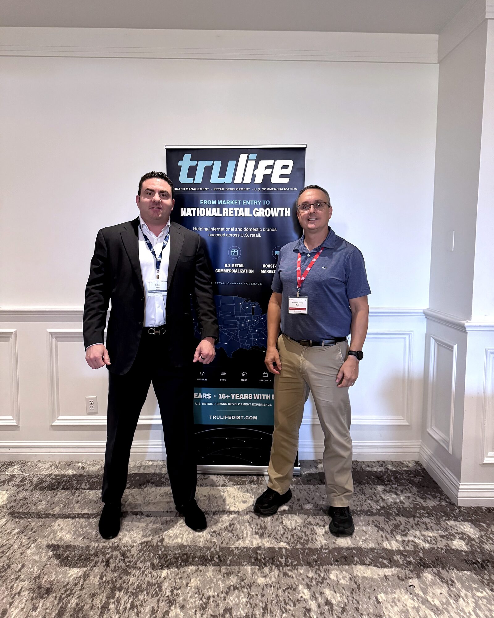 TruLife Distribution meeting with Niemann Foods representatives at ECRM 2026.